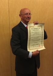 Barrie Maclaurin receiving his award